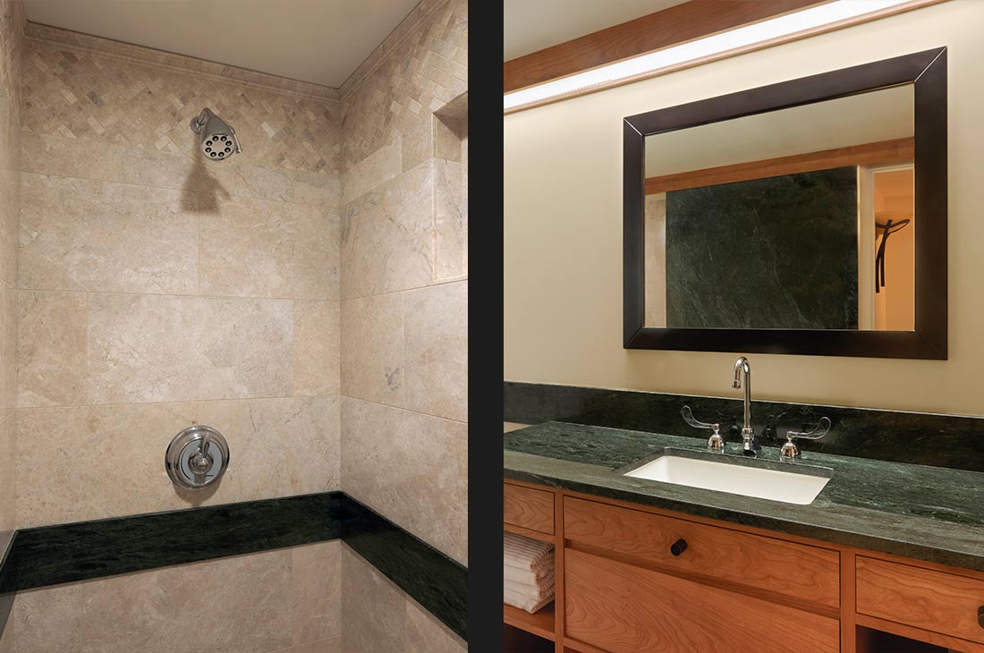 tile shower and second bathroom with green countertop